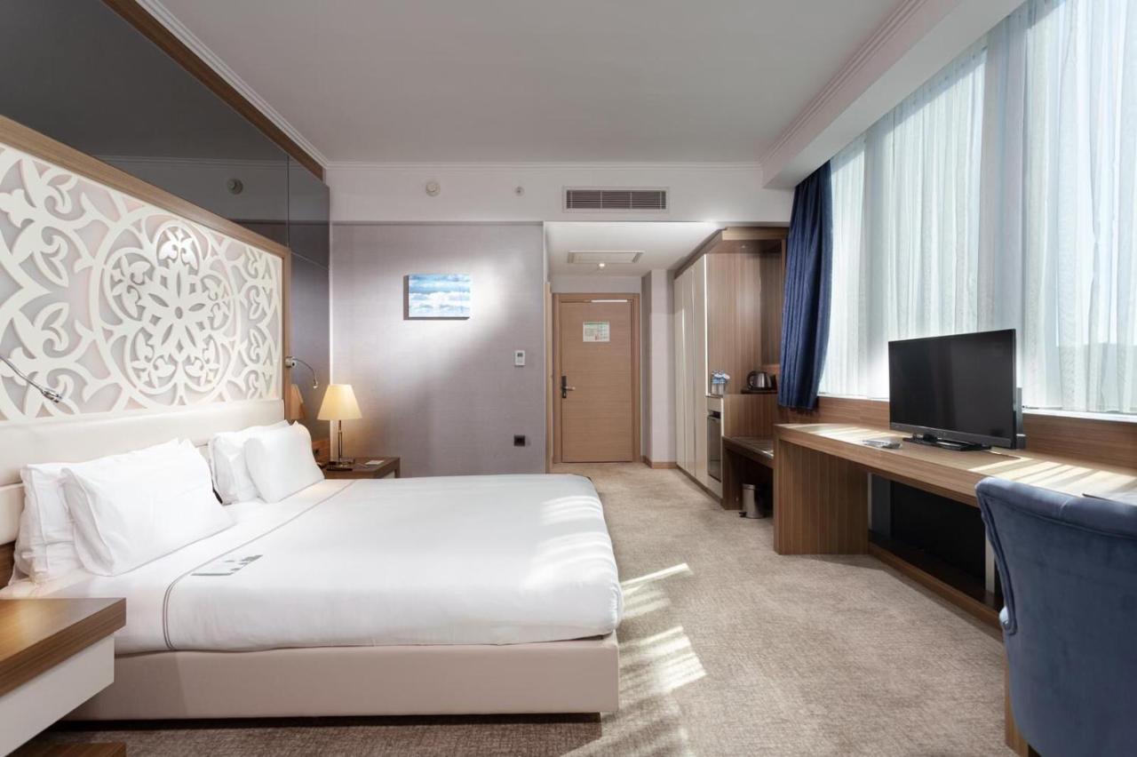 فنادق أنادولو داونتاون أنقرة المظهر الخارجي الصورة A room at the hotel