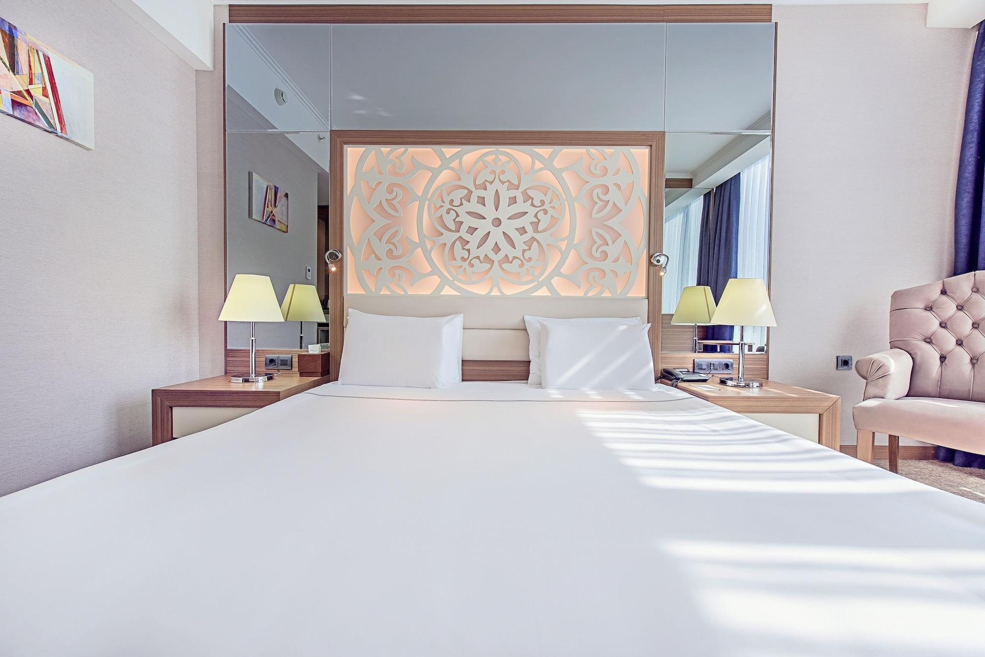 فنادق أنادولو داونتاون أنقرة المظهر الخارجي الصورة A room at the hotel