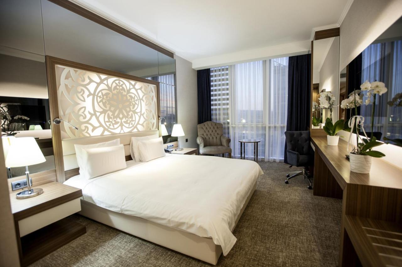 فنادق أنادولو داونتاون أنقرة المظهر الخارجي الصورة A room at the hotel